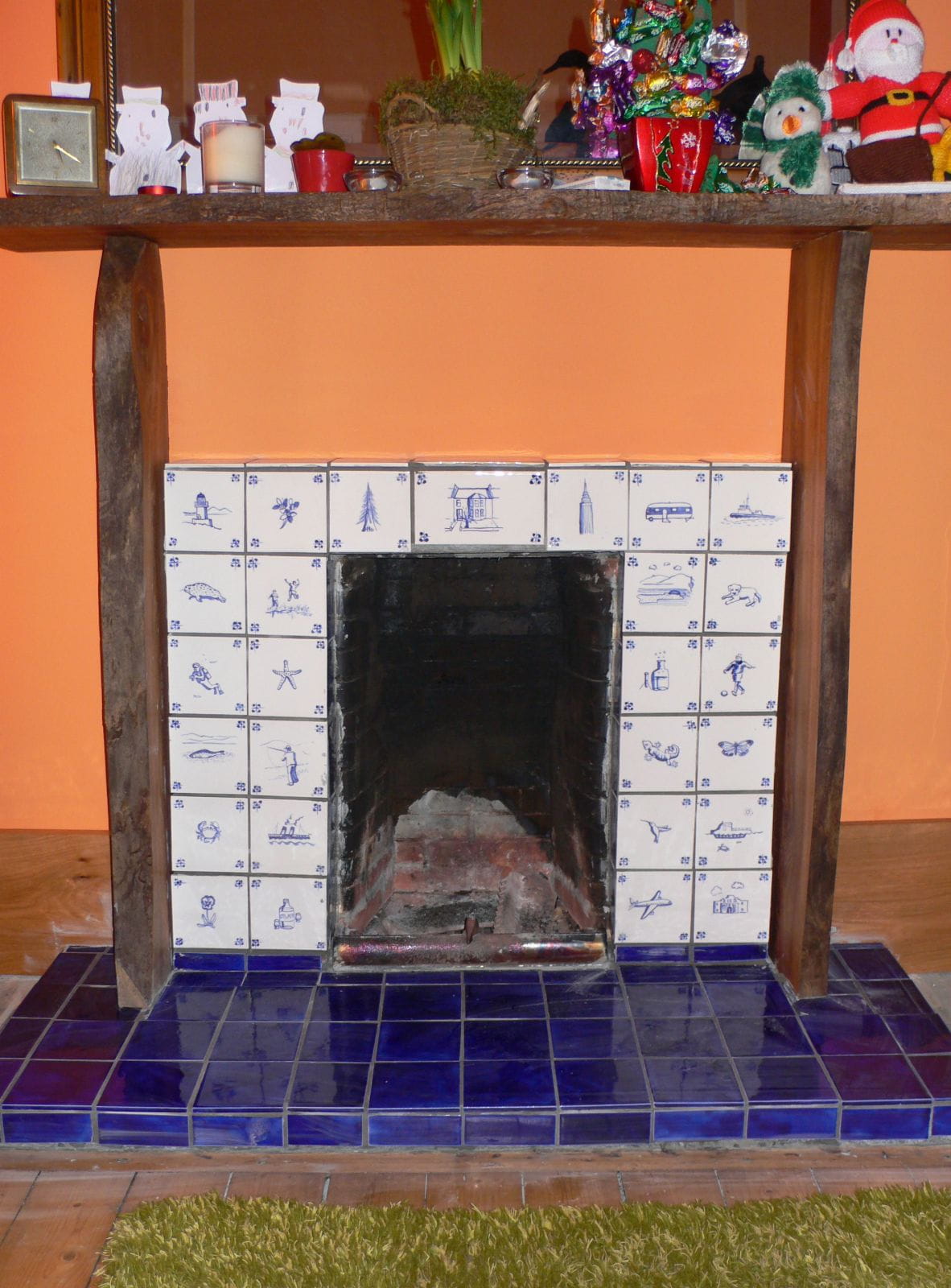 Our new fireplace. Joint project with hubby. (He built the hearth, frame etc)