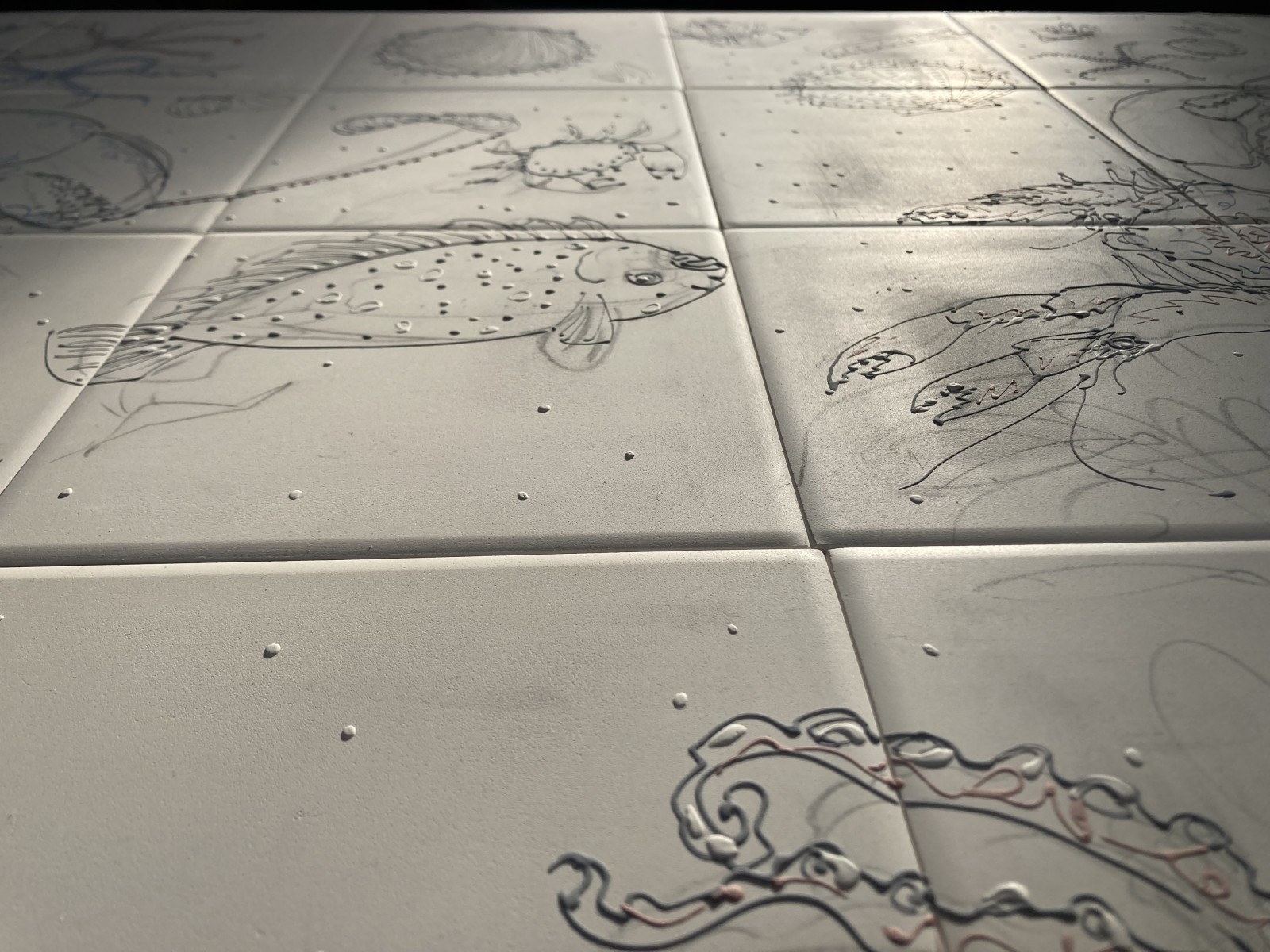 the tubelining lines will hold in all the glaze colours