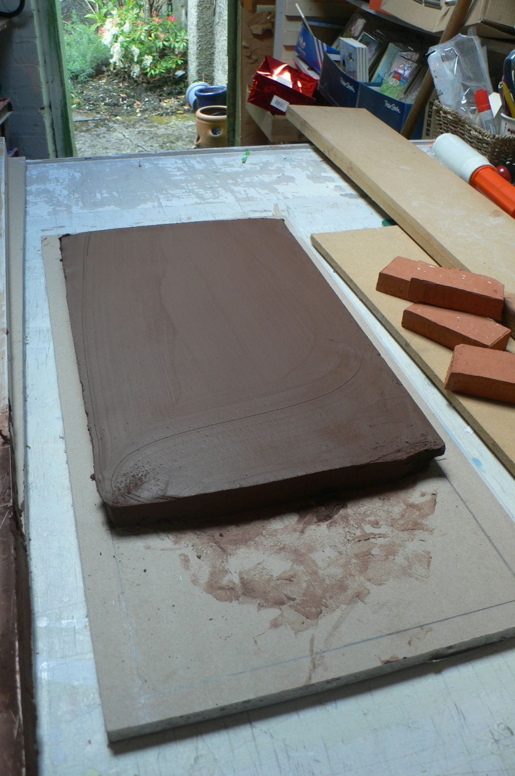 rolled, smoothed, too soft to cut as yet