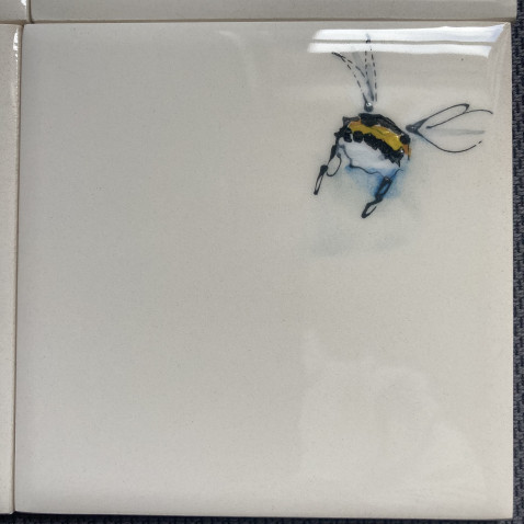 examples of bespoke and commissioned tiles with bees